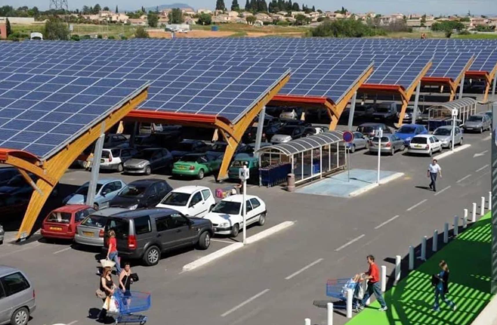 A French parking lot lined with solar panels, date unknowm. 